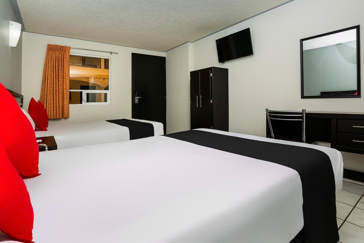 Capital O Hotel Victoria Морелия Экстерьер фото