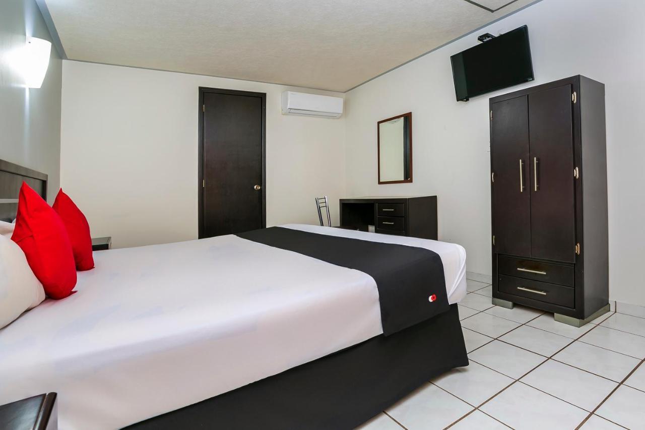 Capital O Hotel Victoria Морелия Экстерьер фото