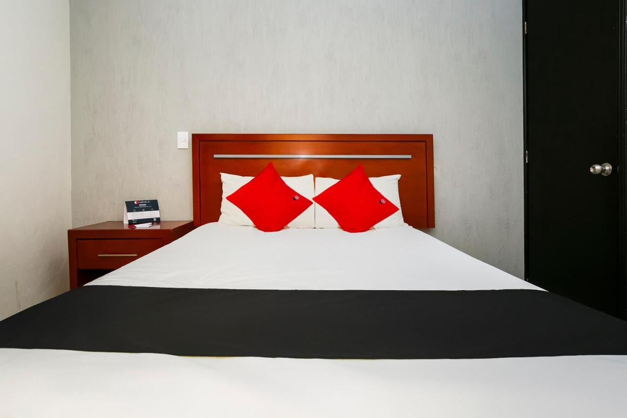 Capital O Hotel Victoria Морелия Экстерьер фото
