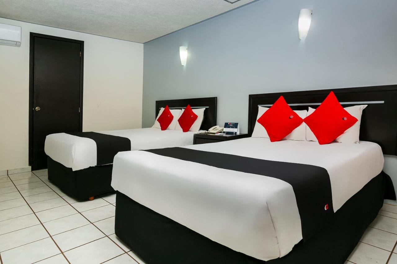 Capital O Hotel Victoria Морелия Экстерьер фото