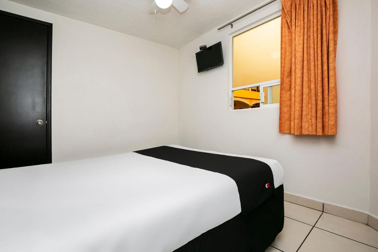 Capital O Hotel Victoria Морелия Экстерьер фото