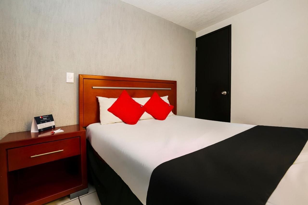 Capital O Hotel Victoria Морелия Экстерьер фото