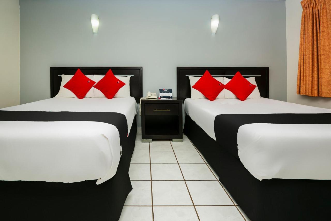 Capital O Hotel Victoria Морелия Экстерьер фото