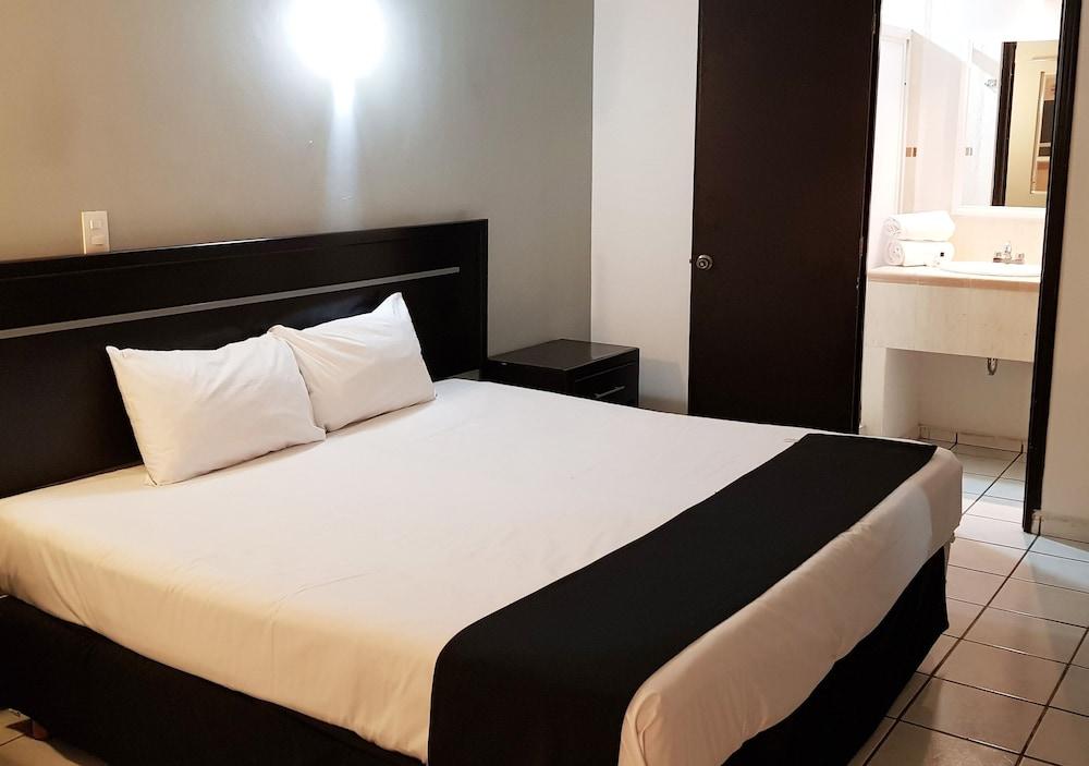 Capital O Hotel Victoria Морелия Экстерьер фото