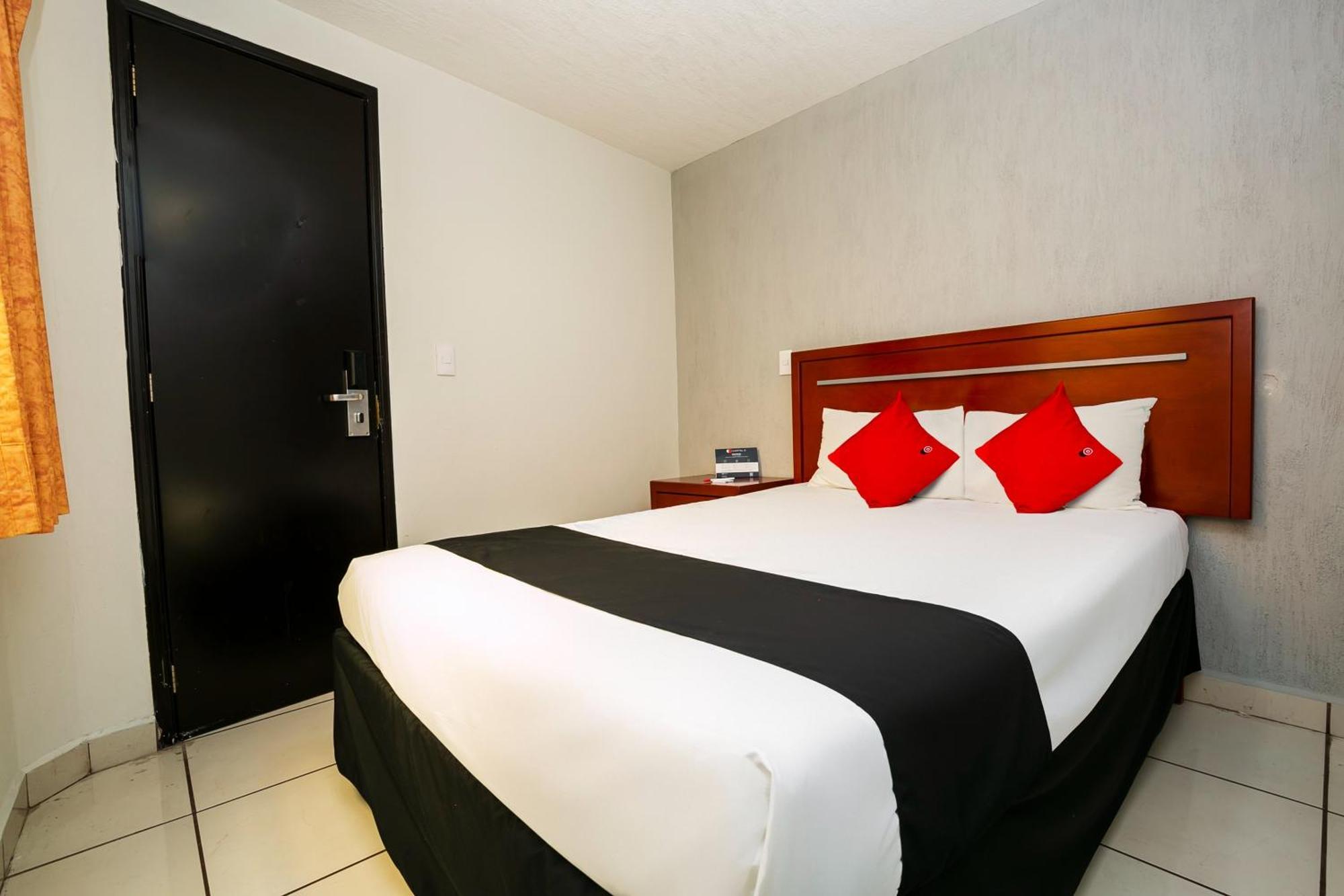 Capital O Hotel Victoria Морелия Экстерьер фото