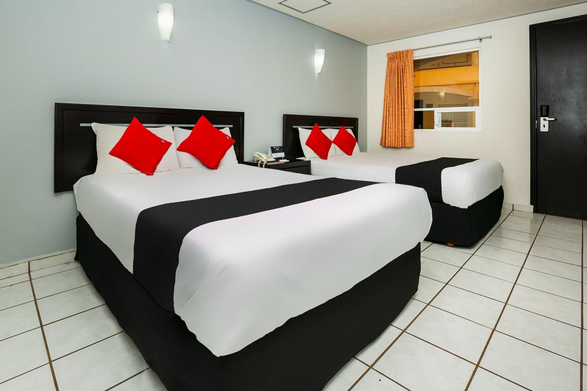Capital O Hotel Victoria Морелия Экстерьер фото